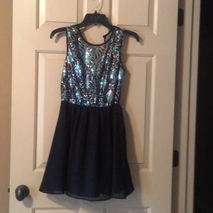 Cute green, black and gold sequined dress.